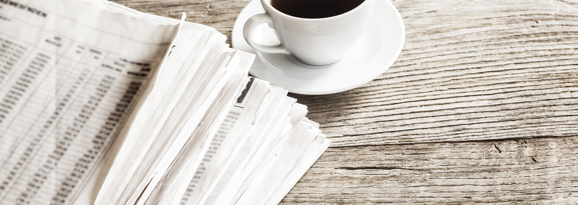 Coffee Cup and Newspaper